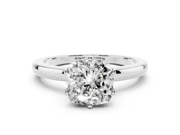 Cushion Cut Solitaire Diamond Ring with Six-Prong Setting on a Classic Band Platinum