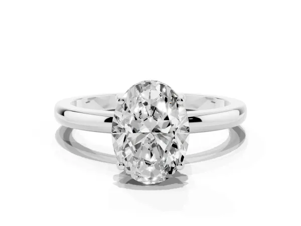 Oval Cut Solitaire Diamond Ring with Prong Setting and Plain Band Platinum