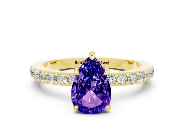 Pear Cut Tanzanite Solitaire Engagement Ring with Pavé Band and Four-Prong Setting Yellow gold