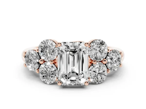 Emerald Cut Cut Diamond Cluster Ring with Round Accent Stones and Prong Setting on a Classic Band Rose gold