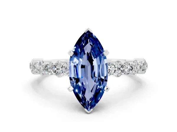 Marquise Cut Blue Sapphire Side Stone Solitaire Ring with Round and Four-Prong Setting White gold