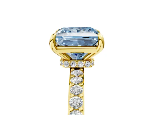 Fancy Blue Princess Cut Diamond Solitaire Engagement Ring with Pavé Band and Four-Prong Setting Yellow gold