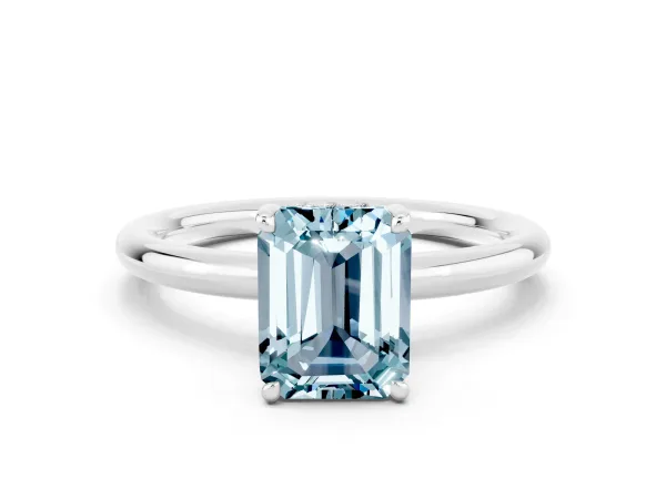 Emerald Cut Aquamarine Solitaire Ring with Thin Band and Four-Prong Setting White gold