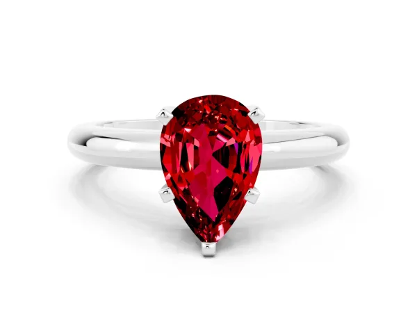 Pear Cut Ruby Solitaire Engagement Ring with Round Band and Four-Prong Setting Platinum