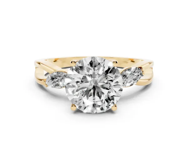 Round Cut Brilliant Diamond Solitaire with Marquise Side Stones on a Twisted Band and Four-Prong Setting Yellow gold