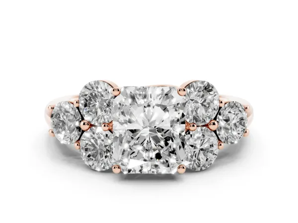 Radiant Cut Cut Diamond Cluster Ring with Round Accent Stones and Prong Setting on a Classic Band Rose gold