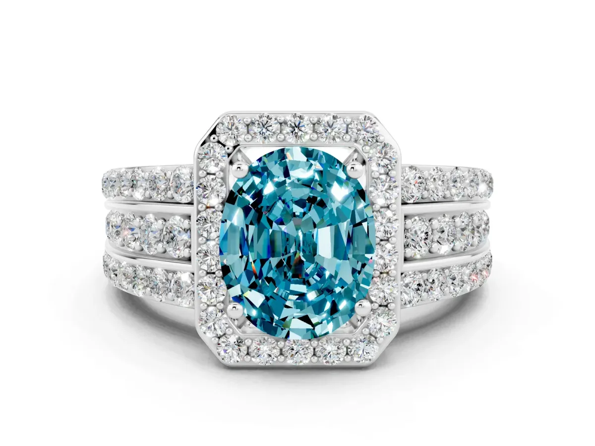 Oval Cut Halo Blue Topaz Ring with Round Split Shank and Prong Setting Platinum