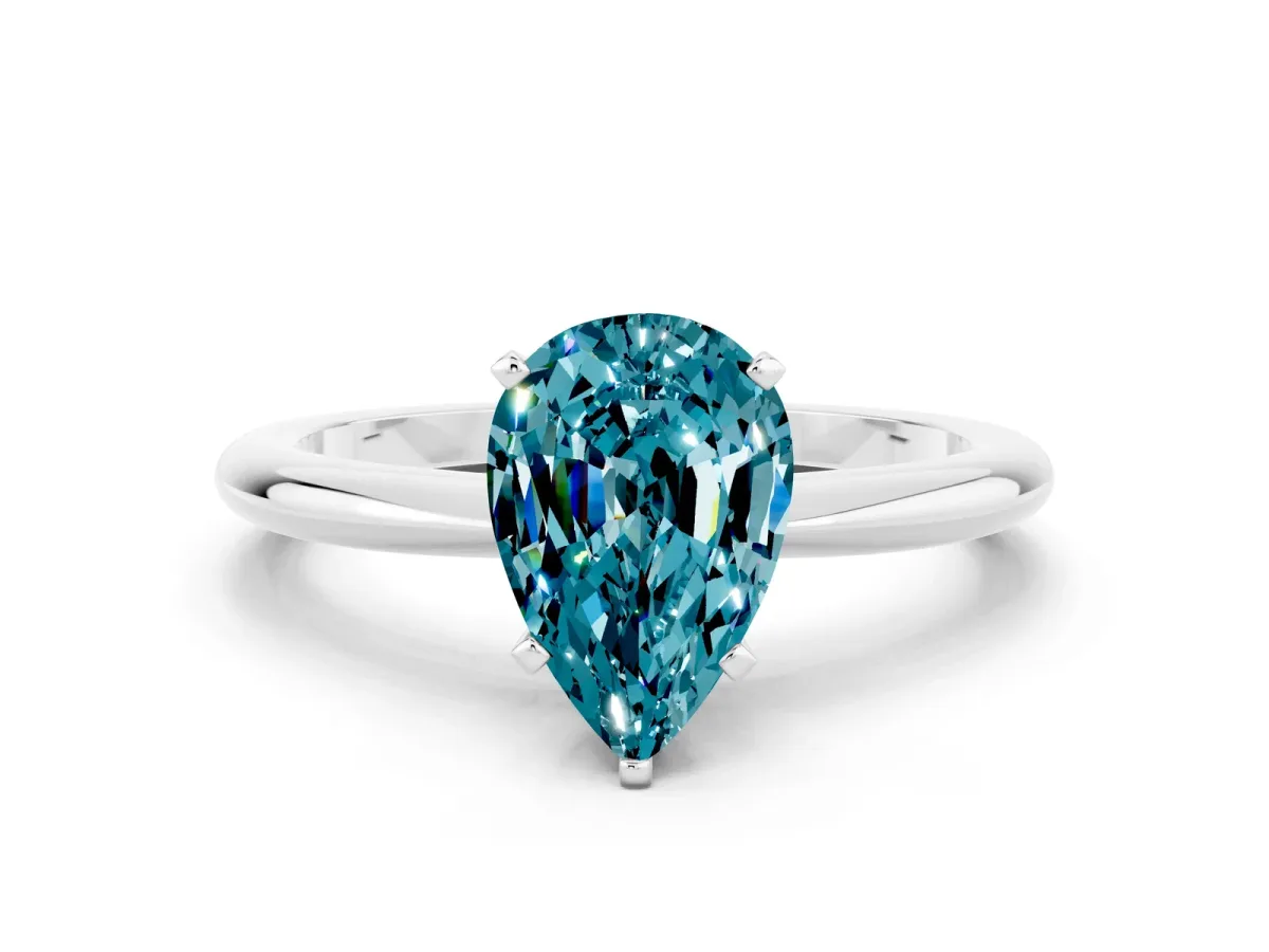 Pear Cut Blue Topaz Solitaire Ring with Six-Prong Setting and Classic Band Silver