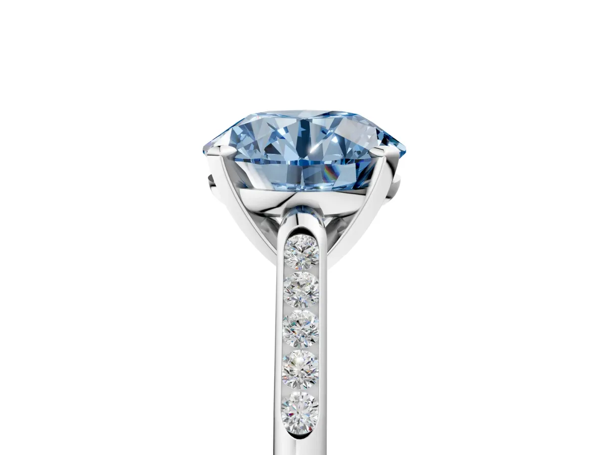 Fancy Blue Round Cut Diamond Solitaire Ring with Channel Set Round Band and Prong Setting Silver