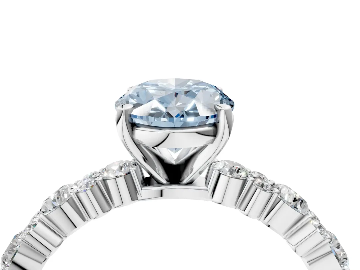 Fancy Blue Oval Cut Diamond Side Stone Solitaire Ring with Round and Four-Prong Setting White gold