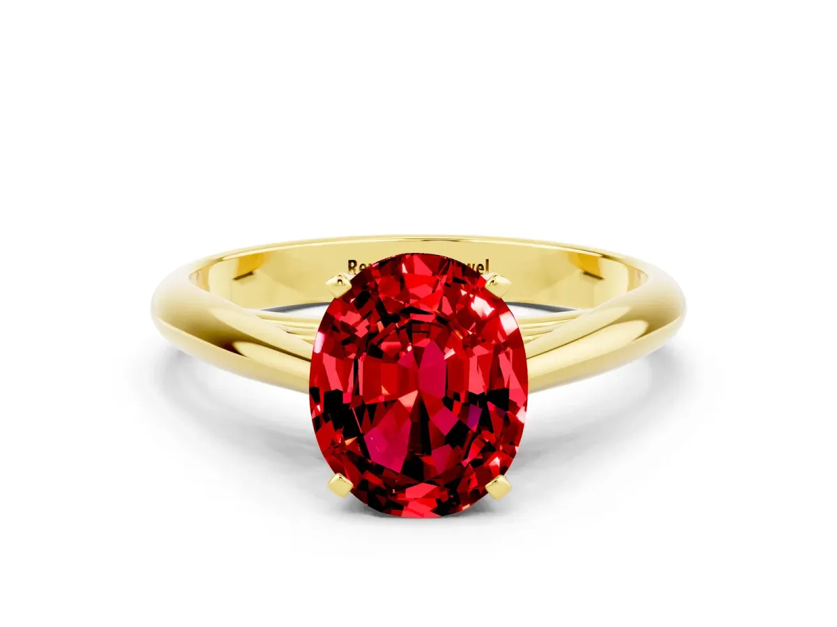 Oval Cut Ruby Solitaire Engagement Ring with Cathedral Setting and Four-Prong Mount Yellow gold