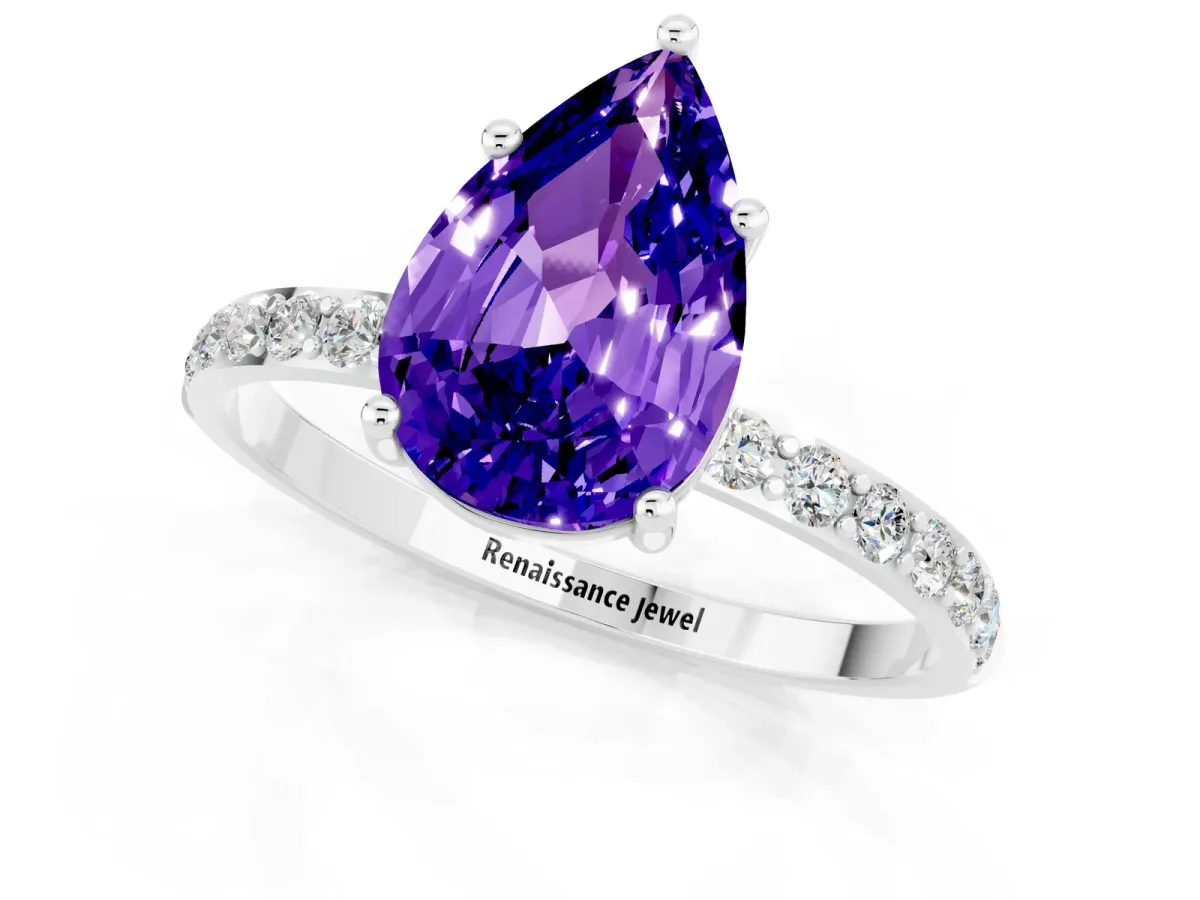 Pear Cut Tanzanite Solitaire Ring with Round Pavé Band and Prong Setting Silver