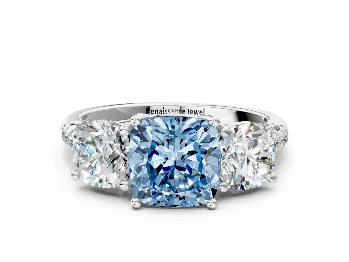 Fancy Blue Three-Stone Cushion Cut Diamond Ring with Round Pavé Band and Prong Setting Silver