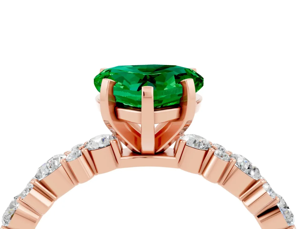 Heart Cut Emerald Side Stone Solitaire Ring with Round and Four-Prong Setting Rose gold
