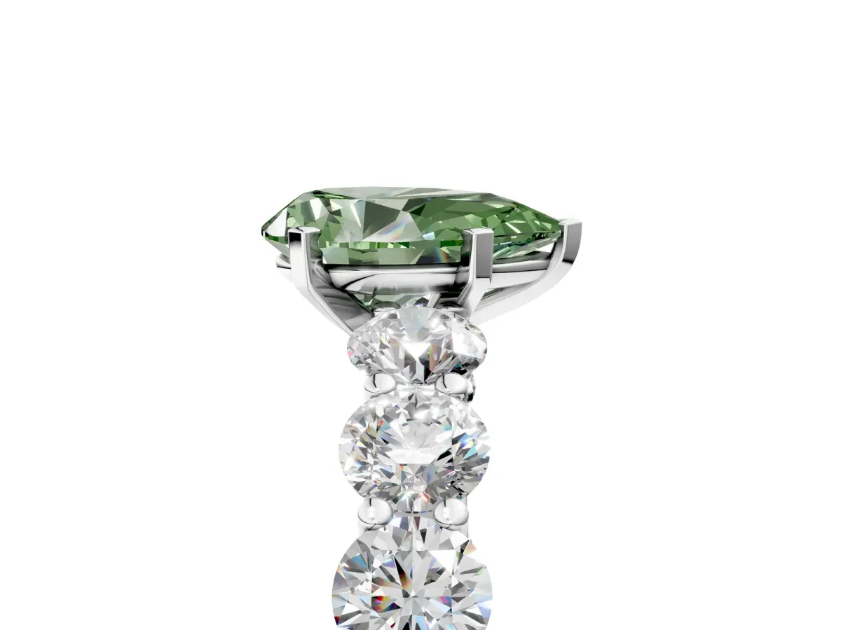 Fancy Green Pear Cut Diamond Prong Setting with Side Stones on a Pave Band Silver