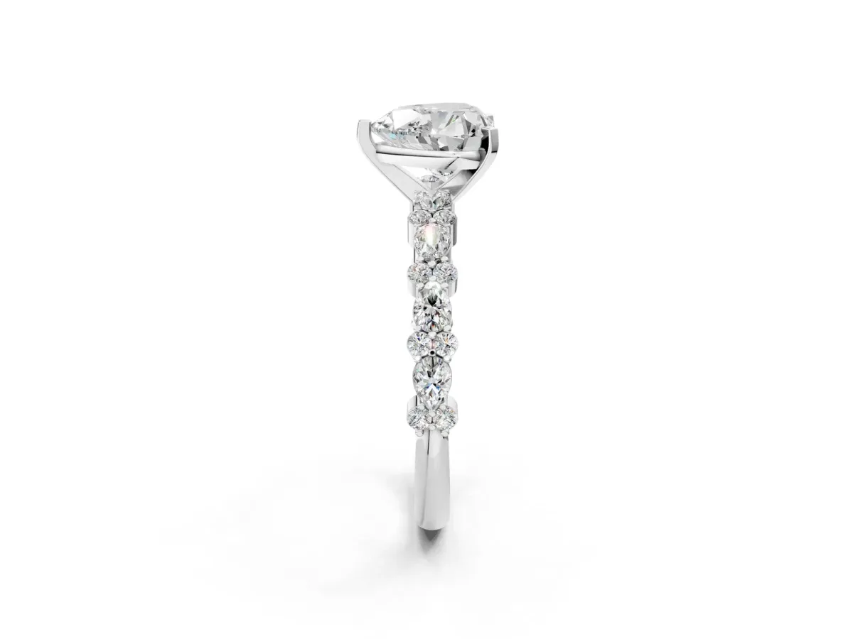 Heart Cut Diamond Side Stone Solitaire Ring with Round and Four-Prong Setting White gold