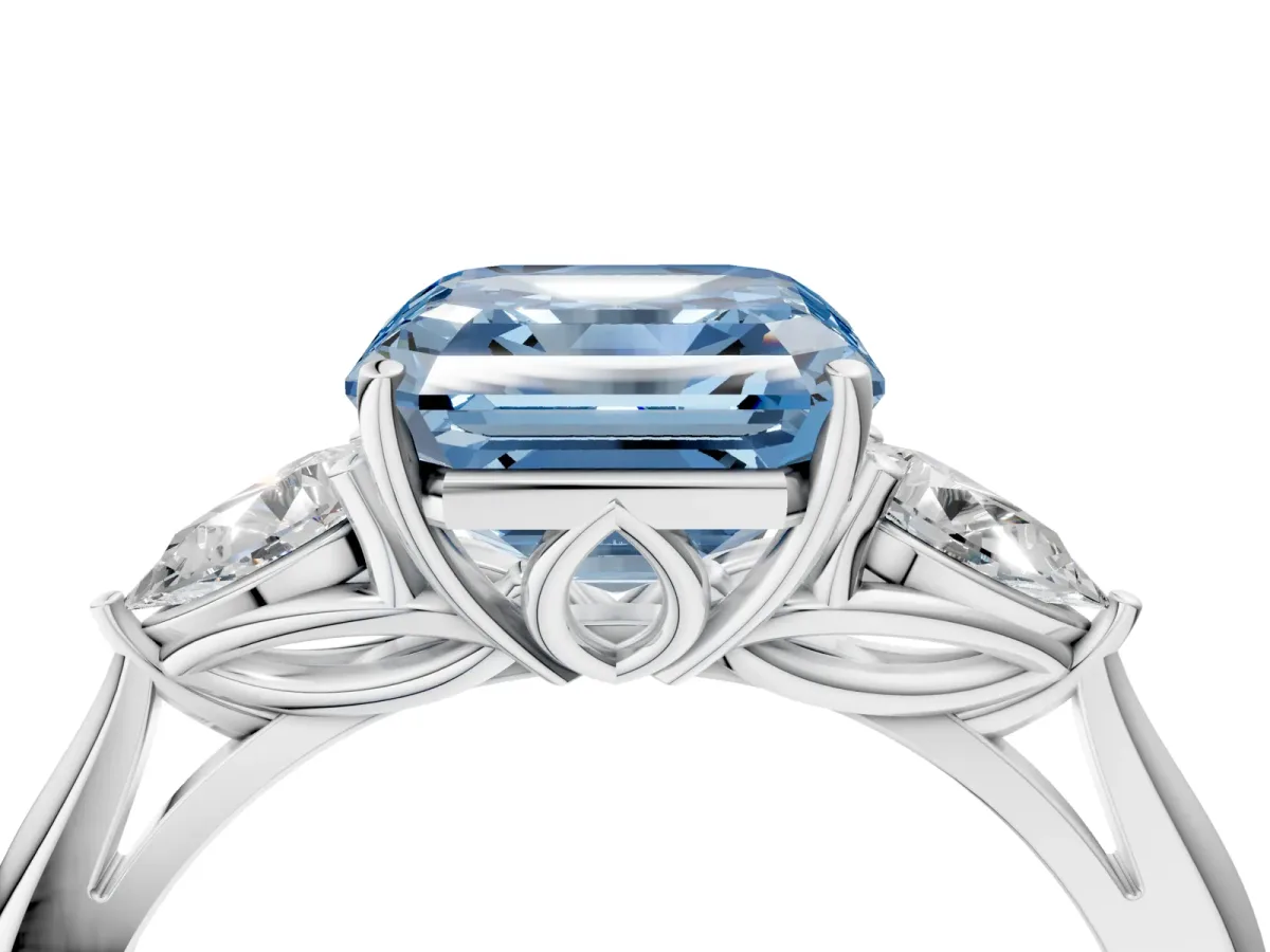 Fancy Blue Three-Stone Asscher Cut Diamond Ring with Pear Side Stones in Four-Prong Setting Platinum