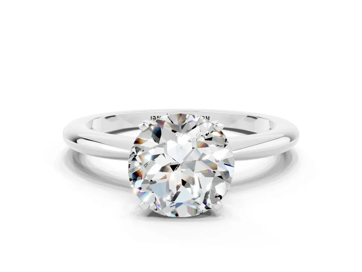 Round Cut Moissanite Solitaire Ring with Six-Prong Setting and Classic Band Silver