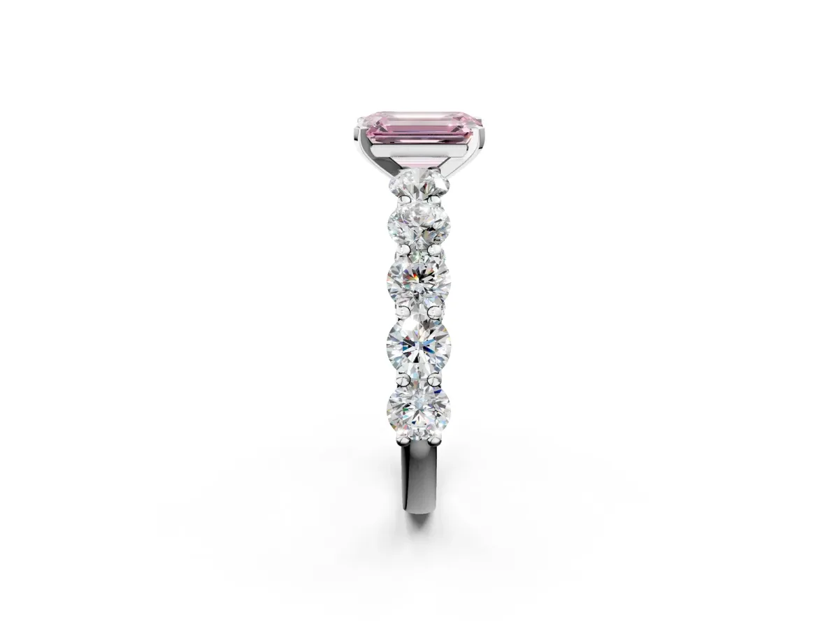 Fancy Pink Emerald Cut Diamond Prong Setting with Side Stones on a Pave Band Platinum