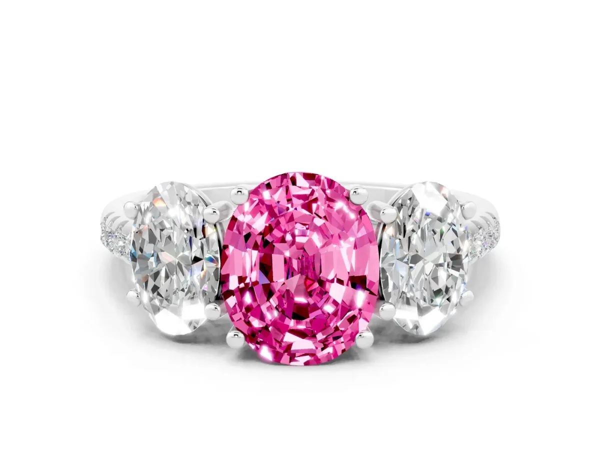 Three-Stone Oval Cut Pink Sapphire Ring with Round Pavé Band and Prong Setting Silver