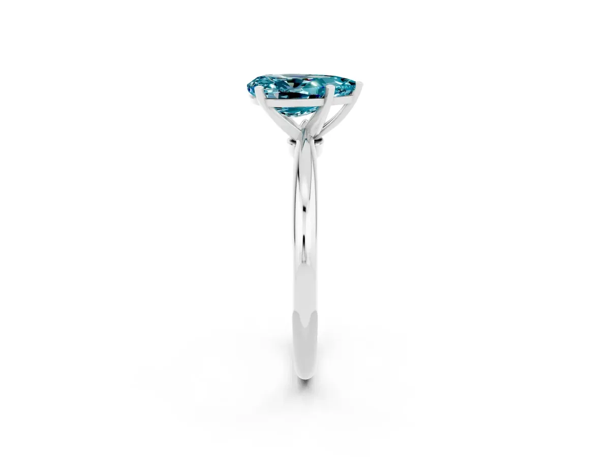 Pear Cut Blue Topaz Solitaire Ring with Six-Prong Setting and Classic Band Silver