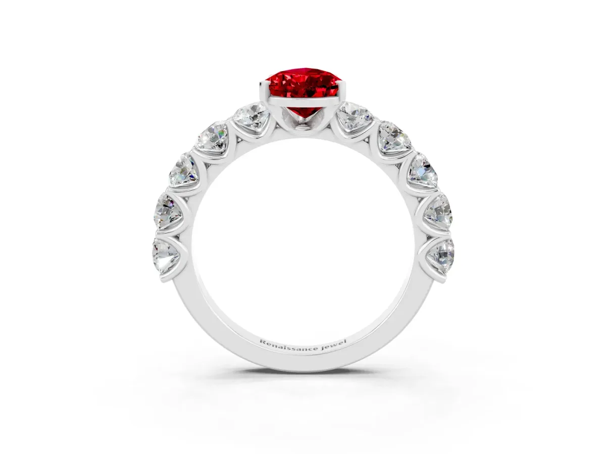 Pear Cut Ruby Prong Setting with Side Stones on a Pave Band Silver