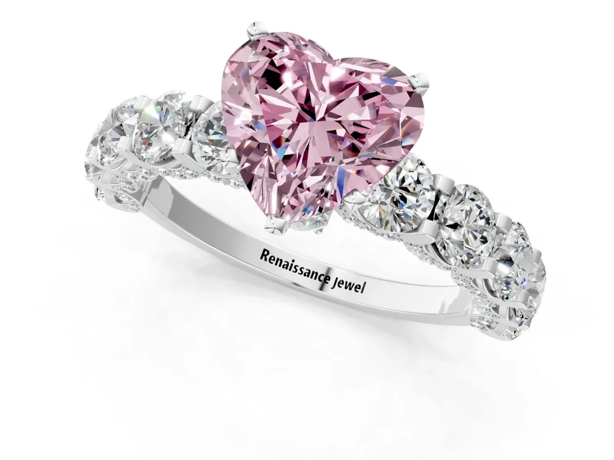 Fancy Pink Heart Cut Diamond Side Stone Engagement Ring with Four-Prong Setting Platinum