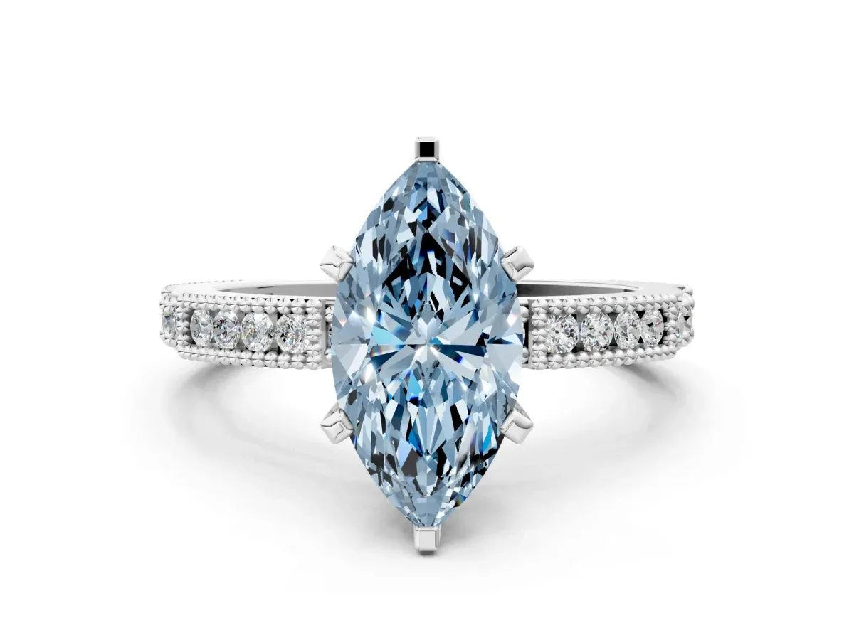 Fancy Blue Marquise Cut Solitaire with Pavé Band and Four-Prong Setting Silver