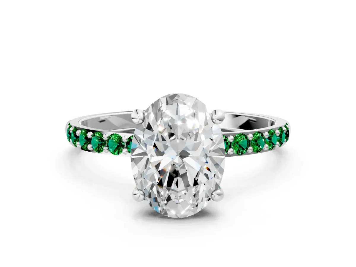 Oval Cut Diamond Solitaire Ring with Round Emerald Pavé Band and Prong Setting Platinum