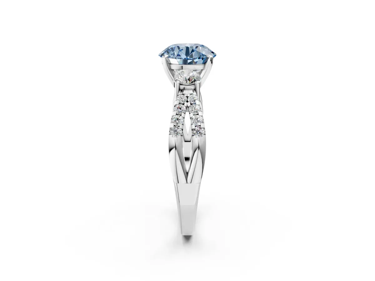 Fancy Blue Round Cut Diamond Three-Stone Ring with Pavé Split Shank and Four-Prong Setting Silver