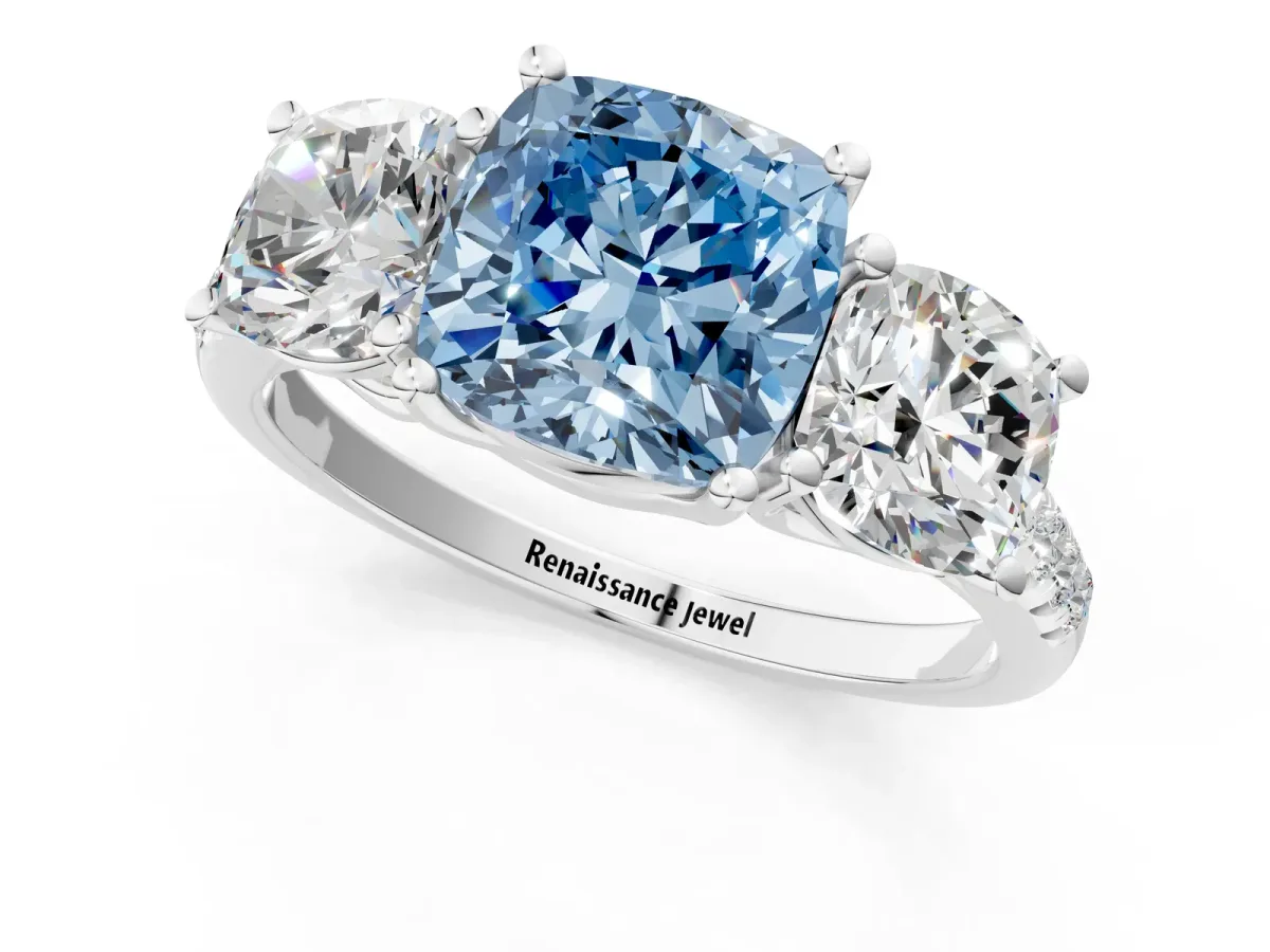 Fancy Blue Three-Stone Cushion Cut Diamond Ring with Round Pavé Band and Prong Setting Silver
