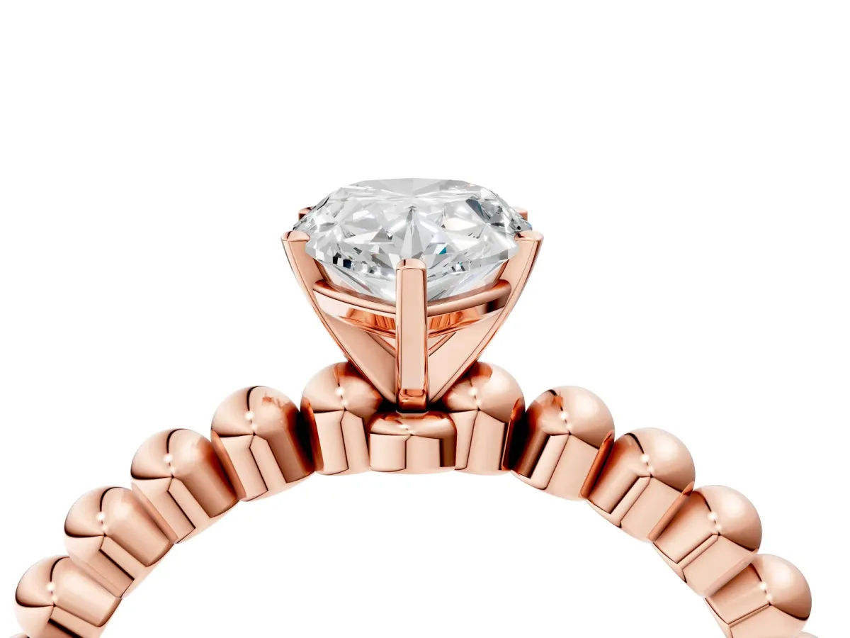 Pear Cut Diamond Solitaire Ring with Beaded Band and Prong Setting Rose gold
