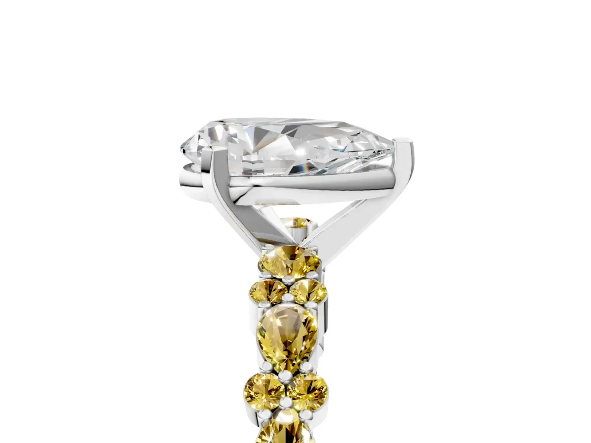 Pear Cut Diamond Side Stone Solitaire Ring with Round Yellow Sapphire and Four-Prong Setting Silver