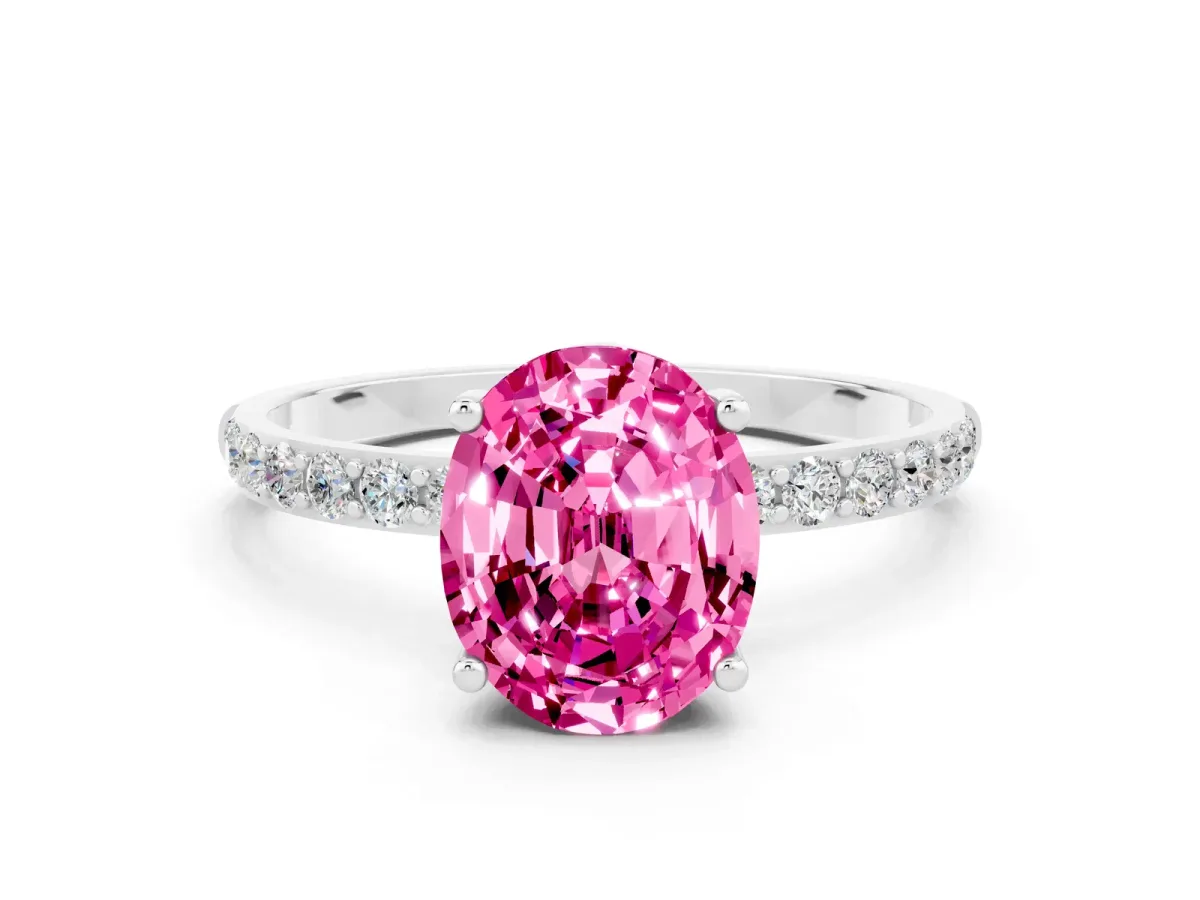 Oval Cut Pink Sapphire Solitaire Ring with Round Pavé Band and Prong Setting Silver