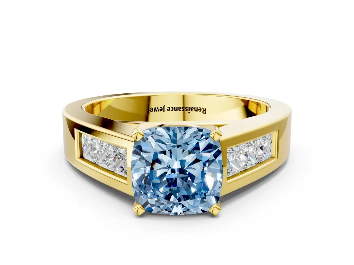 Fancy Blue Cushion Cut Cut Channel Set Solitaire Ring with Four-Prong Setting Yellow gold
