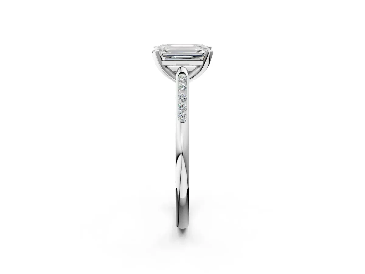 Emerald Cut Diamond Solitaire Ring with Channel Set Round Band and Prong Setting Silver