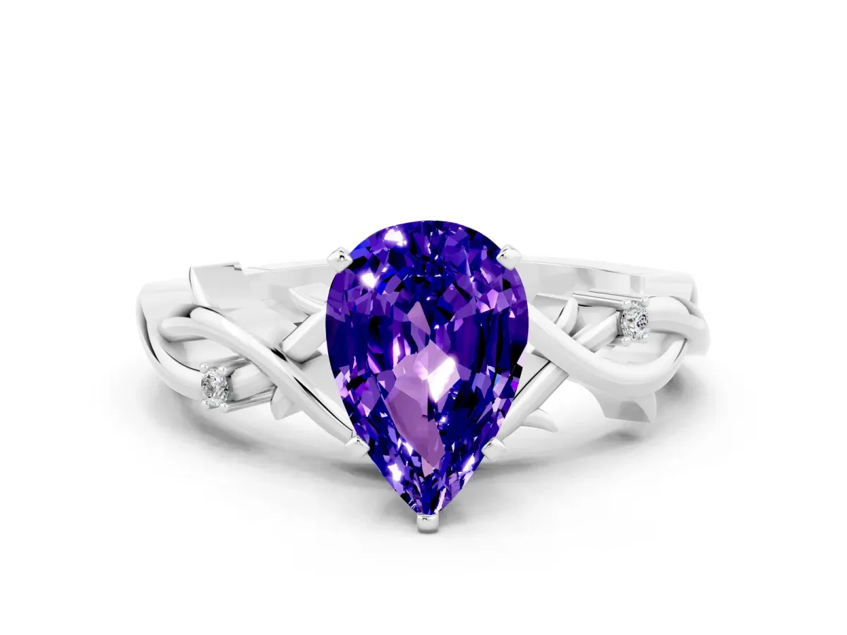 Pear Cut Tanzanite Solitaire Ring with Twisted Band and Prong Setting White gold