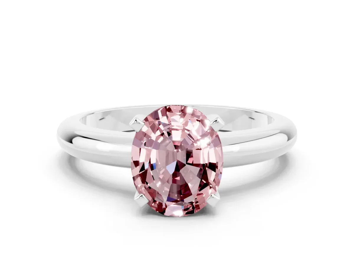 Oval Cut Morganite Solitaire Engagement Ring with Round Band and Four-Prong Setting Silver