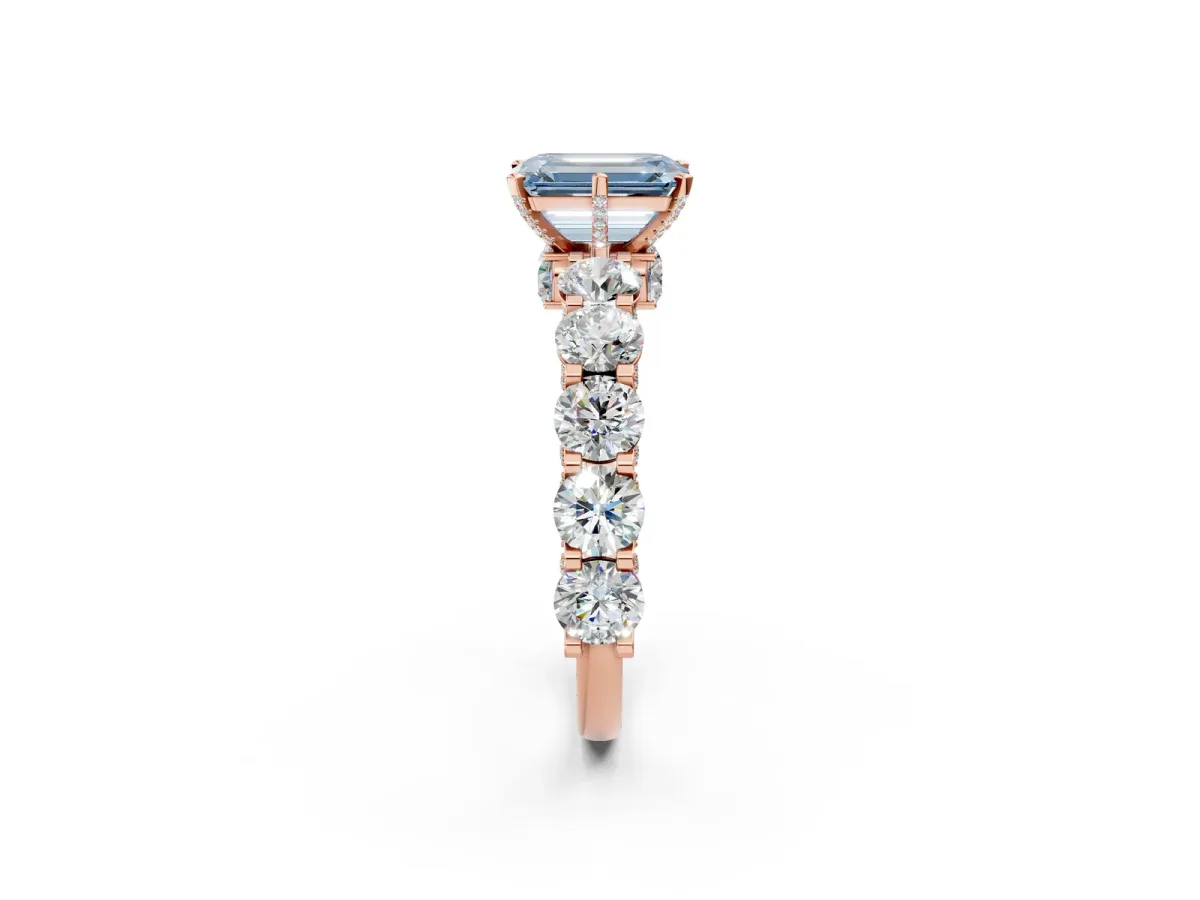 Fancy Blue Emerald Cut Diamond Side Stone Engagement Ring with Four-Prong Setting Rose gold