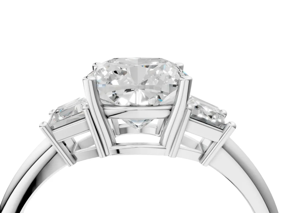 Cushion Cut Diamond Three-Stone Ring with Trapezoid Side Stones and Prong Setting White gold