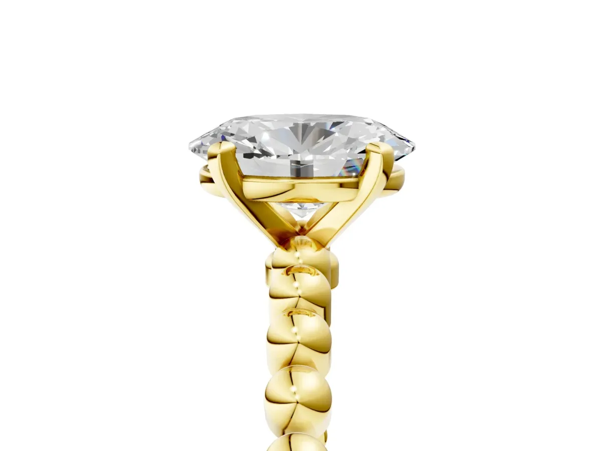 Oval Cut Diamond Solitaire Ring with Beaded Band and Prong Setting Yellow gold