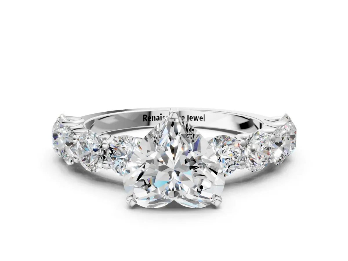 Heart Cut Diamond Prong Setting with Side Stones on a Pave Band Silver