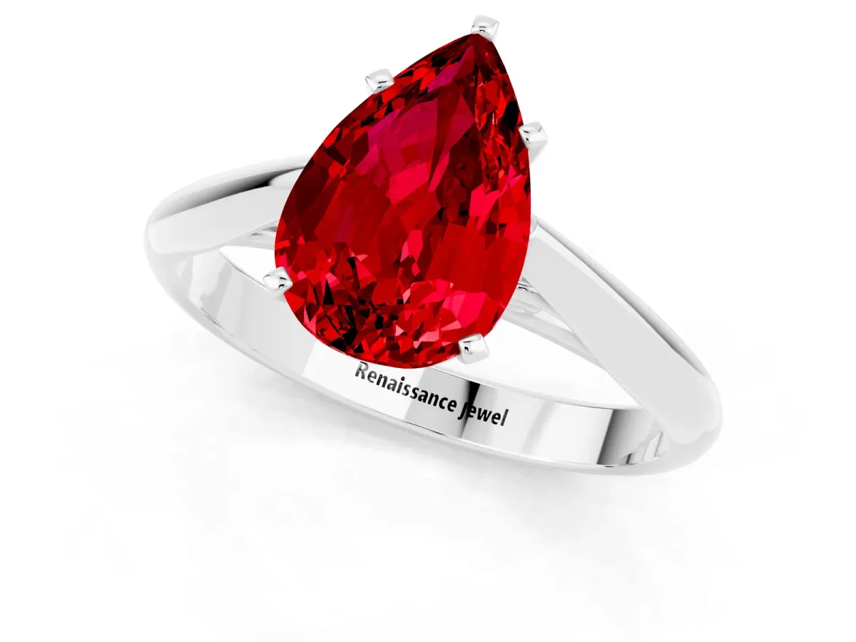 Pear Cut Ruby Solitaire Engagement Ring with Cathedral Setting and Four-Prong Mount White gold
