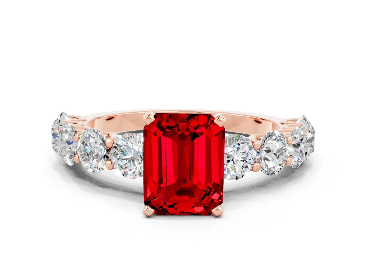 Emerald Cut Ruby Prong Setting with Side Stones on a Pave Band Rose gold