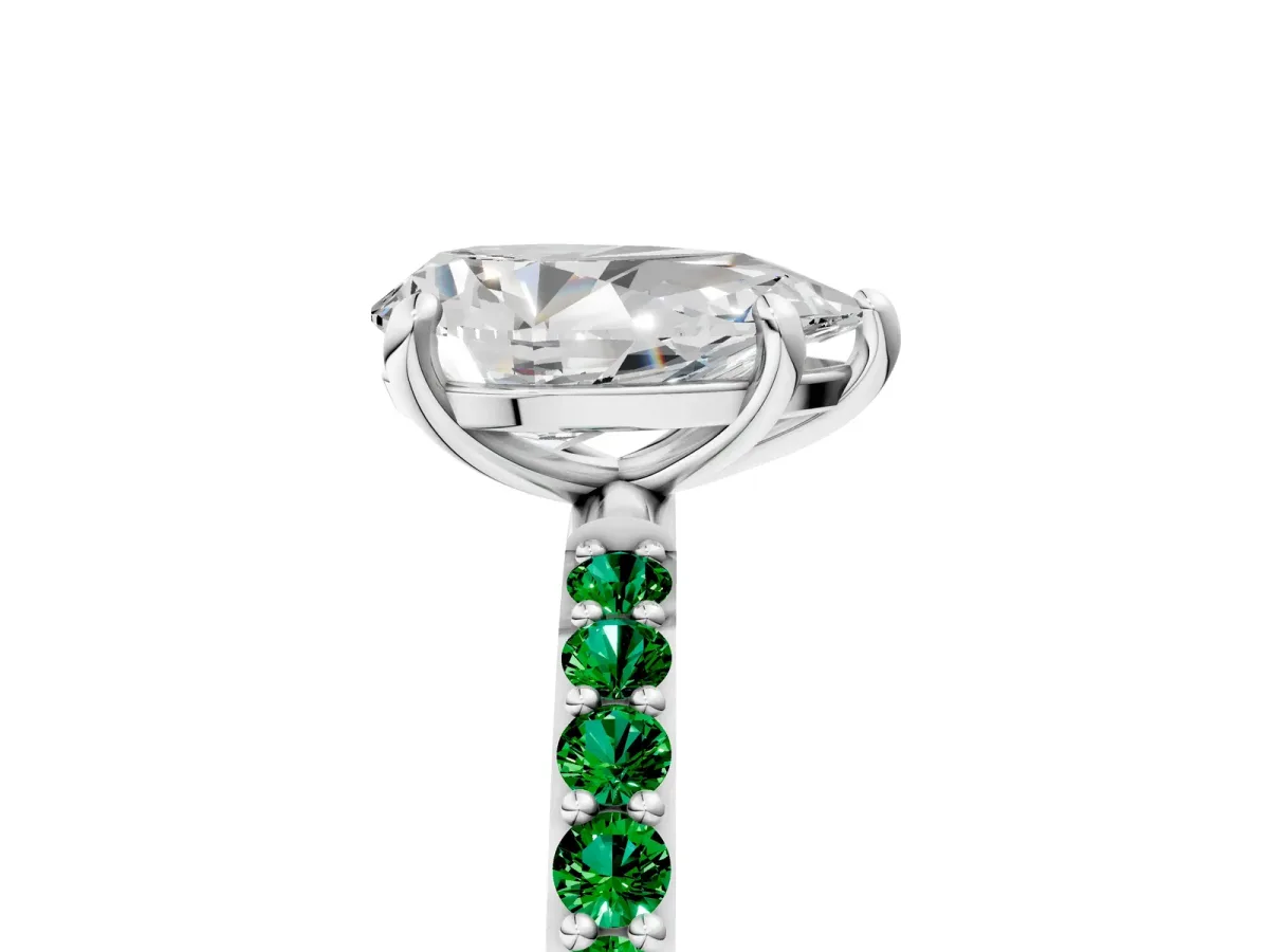 Pear Cut Diamond Solitaire Ring with Round Emerald Pavé Band and Prong Setting Silver