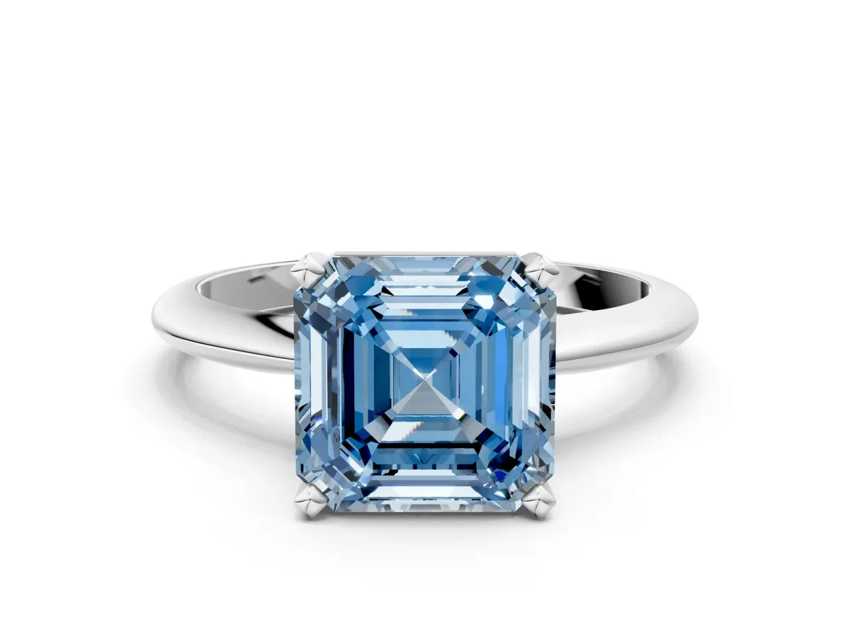 Fancy Blue Asscher Cut Cut Solitaire Ring with Four-Prong Setting on a Classic Band Platinum