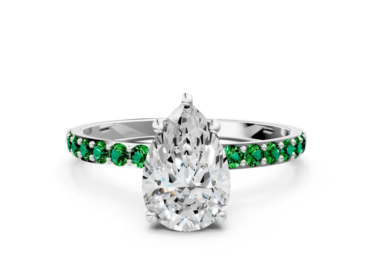 Pear Cut Diamond Solitaire Ring with Round Emerald Pavé Band and Prong Setting Platinum