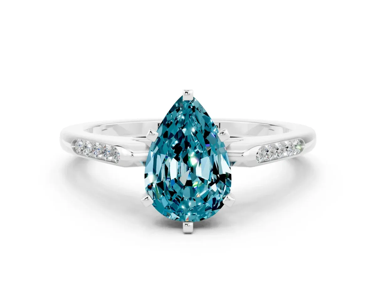Pear Cut Blue Topaz Solitaire Ring with Channel Set Round Band and Prong Setting Silver