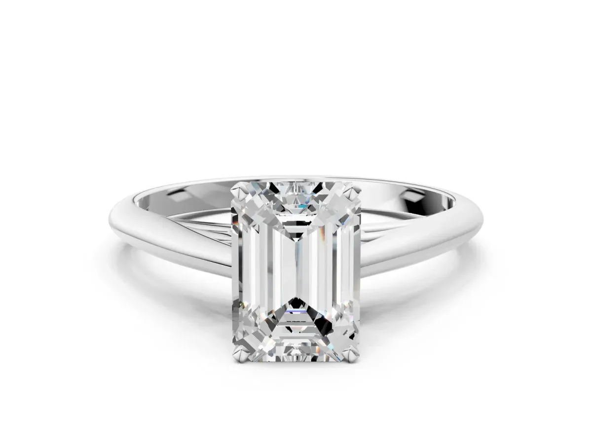 Emerald Cut Diamond Solitaire Engagement Ring with Cathedral Setting and Four-Prong Mount White gold