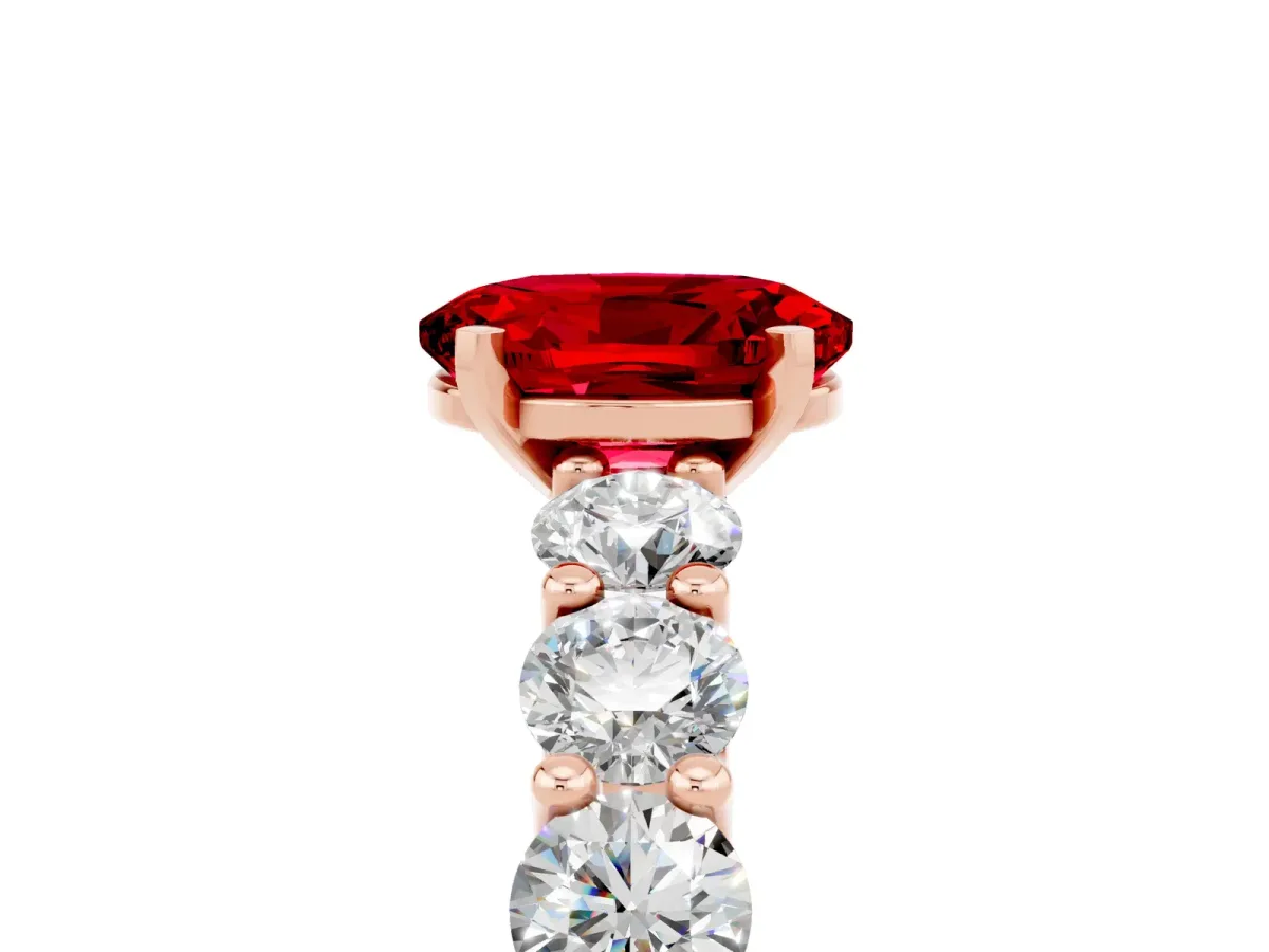 Oval Cut Ruby Prong Setting with Side Stones on a Pave Band Rose gold